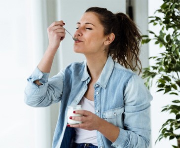 Woman enjoying yogurt