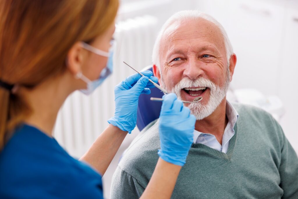 Man smiling during dental checkup 